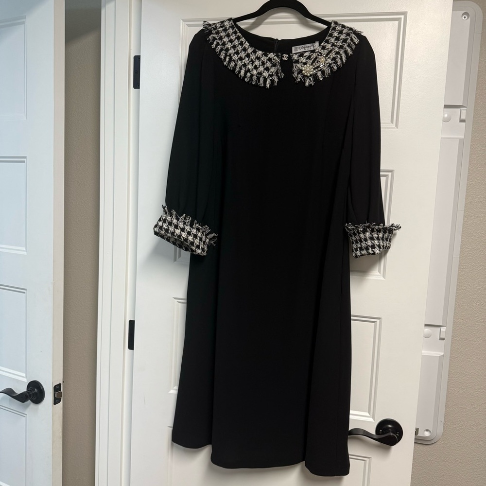 Elegant Black Dress with Houndstooth Accents